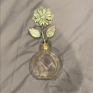 Decorative small glass vase with flower topper